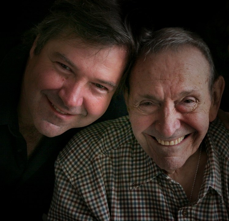 Eric Schneider with his father